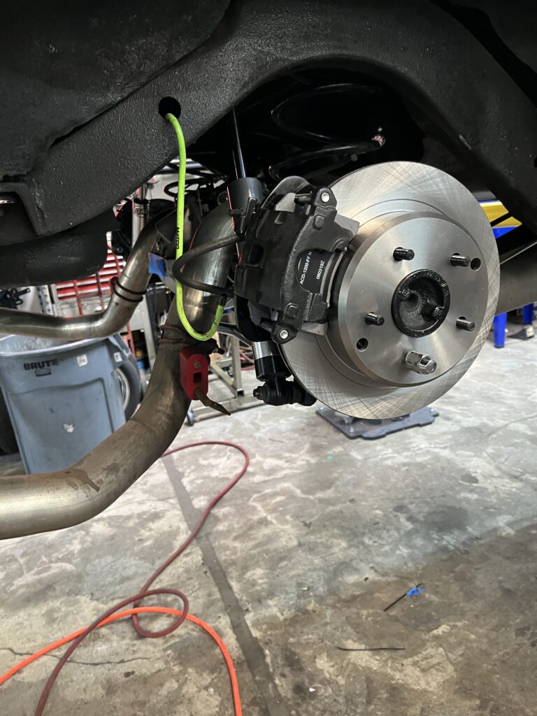 A rear brake set up to highlight an easy car maintenance task.