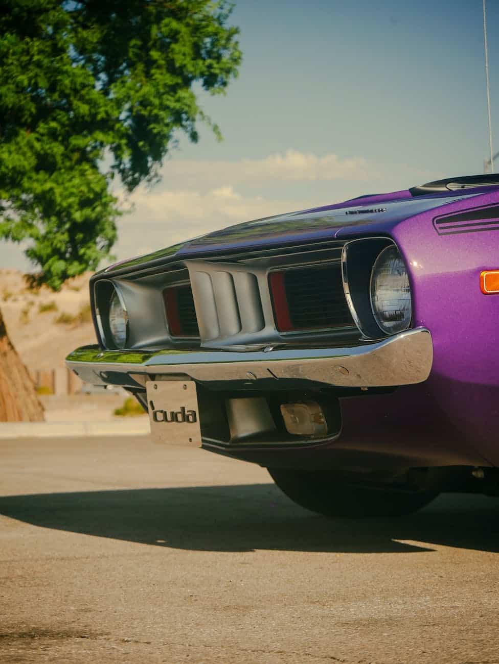 close up of purple plymouth barracuda car