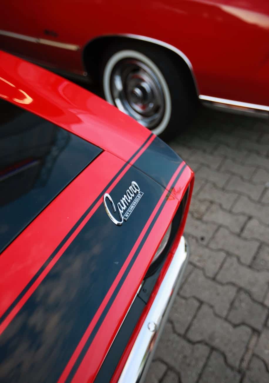 a red and black car parked