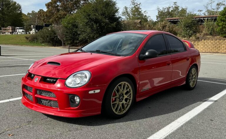 A Red Dodge Neon SRT-4, highlighted as one of the cheapest turbocharged sports cars on the market.