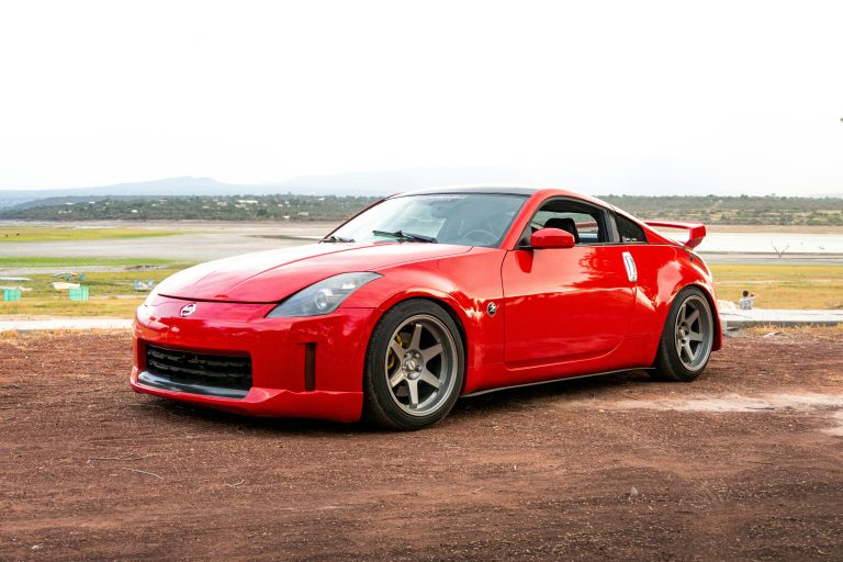 A red nissan 350z highlighting a premier budget jdm car